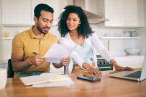 couple looking over tax paperwork