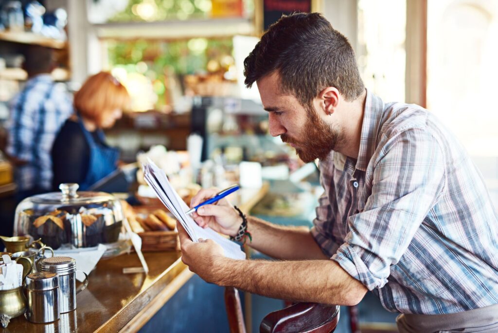 business owner reviewing paperwork