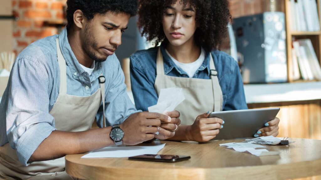 couple reviewing business expenses